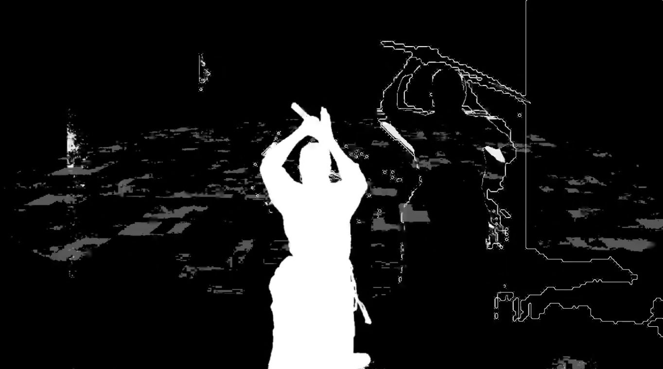 Martial arts swinging sowrd silhoutte in front of dark broken digital photo background