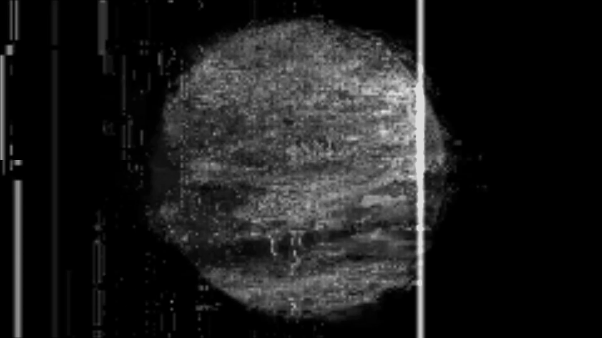 Black and white grainy ring with line going through it, like microscope sample of a ghost spirit, dark, creepy atmosphere